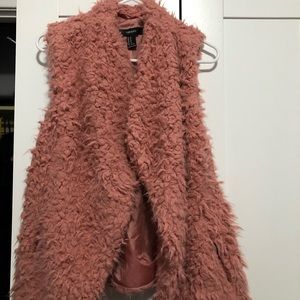 Pink furry vest